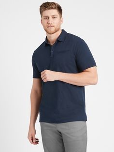 The perfect polo for days spent on and off the links, our Luxury Touch Performance Golf Polos are made with special anti-odor and moisture-wicking properties to keep it feeling fresh.  Plus, this 100% cotton fabric is specially treated to resist fading and discoloration.  Relaxed polo collar with contrast color at button placket.  Short sleeves.  Chest pocket.  Straight hem.  Standard Fit: A little room through the chest, arms and waist.  Short sleeves.  Hits at the hip.  Front body length (size Casual Golf Polo T-shirt, Sporty Polo Collar T-shirt For Golf, 4-way Stretch Polo Shirt For Golf, Blue Moisture-wicking Polo Shirt For Golf, Cotton Golf Polo Shirt With 4-way Stretch, Golf Polo Shirts, Golf Polo, Polo Collar, Button Placket