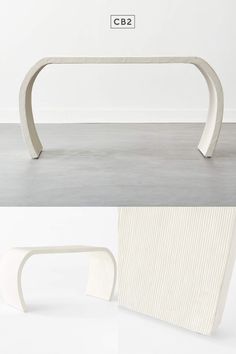 a bench made out of concrete and white paint