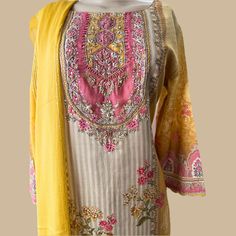 Sunshine Elegance: Yellow Chinon Silk 3-Piece Indian Suit with Sequins Dupatta Brighten up your wardrobe with our stunning yellow Chinon silk 3-piece Indian suit, featuring a luxurious sequins dupatta. This thoughtfully designed ensemble combines vibrant elegance with modern sophistication, perfect for weddings, festive celebrations, and special occasions. Key Features: Premium Chinon Silk Fabric: Crafted from high-quality Chinon silk, offering a soft, luxurious, and comfortable fit. Elegant Seq Spring Yellow Palazzo Set With Resham Embroidery, Yellow Embroidered Raw Silk Palazzo Set, Yellow Chanderi Sharara With Printed Motifs, Designer Yellow Kurta For Spring, Bohemian Dabka Work Sets For Spring, Yellow Embroidered Palazzo Set In Raw Silk, Yellow Cotton Sharara With Printed Motifs, Embroidered Yellow Palazzo Set In Raw Silk, Embroidered Yellow Raw Silk Palazzo Set