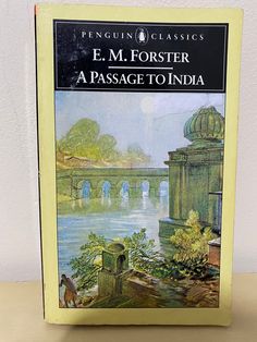 a book with an image of a bridge in the background and text on it that reads, e m foster a passage to india