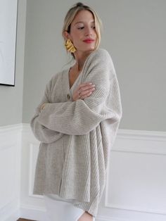 Our favorite slouchy cardigan in a luxuriously soft cashmere blend. The Everyday Cardigan features an oversized fit making it perfect for layering. You'll never want to take this one off. Fabric: 90% Wool, 10% Cashmere. Color-way: Oatmeal Heather. Model is 5'9" and wearing size small. Dry Clean Only. Oversized Cozy Taupe Sweater, Oversized Neutral V-neck Sweater, Oversized V-neck Sweater Coat For Layering, Fall Soft Knit Neutral Cardigan, Neutral Soft Knit Cardigan For Fall, Oversized Taupe Sweater For Layering, Cozy Relaxed Fit Sweater Coat For Everyday, Cozy Everyday Relaxed Fit Sweater Coat, Fall Cream Cardigan For Everyday Wear