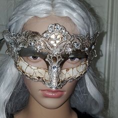 Our Classic Elegant Resin With Macrame Lace Mask Is Created For Our High Fashion Collection Line Of New Masks This Season. The Sparkling Rhinestone Details Give This Mask Stunning And Classical Features. Wearing This Classic Venetian Resin Mask To Any Events Will Guarantee An Absolute Stunning Impression That Will Last Forever In Everyone's Heart. Materials/Techniques: Paper Mache, High Fashion Macrame Lace, Acrylic Paint, Crackle Design, Macrame Lace, Satin Ribbons Size Measurement: Approx. 6.2 Leaf Masquerade Mask, Lace Masquerade Mask, Chunky Gold Chain Necklace, Lace Masquerade Masks, Alexander Mcqueen Sunglasses, Venetian Masquerade Masks, Pom Pom Slippers, Macrame Lace, Chunky Gold Chain