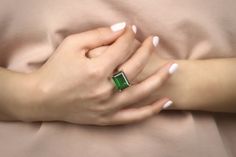 A luxuriant Emerald is the main showcase of this green ring. This Sterling silver ring is handcrafted with a timeless design that will elegantly go with your style. Wear it as a fashion ring or wrap it as a wonderful gift for a wonderful woman. ☛ 𝒜𝐵𝒞 - Add Engraving - https://etsy.me/2ZSRjhu ☛ Ring size - Select the size you would like from the drop down menu ♥ Gemstone Type - Emerald (Lab Created) ♥ Gemstone Size - 13x18mm ♥ Gemstone Cut - Faceted Rectangle ♥ Metal Type (Main Photo) - 925 St Rectangular Emerald Gemstone Rings, Luxury Emerald-cut Birthstone Ring For Formal Occasions, Luxury Emerald-cut Birthstone Ring As A Gift, Elegant Emerald-cut Birthstone Gemstones, Luxury Square-cut Emerald Ring For May Birthstone, Silver Emerald Ring, Emerald Ring Vintage, May Birthstone Rings, Green Emerald Ring