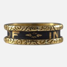 Victorian 18ct yellow gold and black enamel memorial mourning ring, inscribed with 'IN MEMORY OF' within a gold foliate border and 'Mary Alice Holbrey, Born May 12, 1860. Died April 17, 1873' inside. Hallmarked Birmingham, 1874, '18' for 18 carat gold. * Period: Late 19th Century. * Date: 1874. * Maker: 'H&U'. * Measurement: UK size M (leading edge), US size 6 1/4 (leading edge). Band width approximately 5.7mm. * Weight: 4.5 grams. Condition: Good, with minor surface scratches. Enamel in good co Vintage Gold Enamel Ring Stamped 14k, Victorian Enamel Ring Engraved For Anniversary, Victorian Engraved Enamel Ring For Anniversary, Vintage Gold Ring For Memorial, Black Heirloom Ceremonial Jewelry, Black Heirloom Jewelry For Ceremonial Occasions, Black Heirloom Jewelry For Ceremonial Use, Gold Enamel Ring With Black Detail For Formal Occasions, Antique Engraved Yellow Gold Enamel Ring