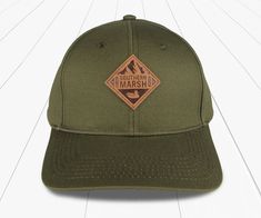 Olive | Trail Hat | Side Adjustable Six-panel Hat With Embroidered Patch, Cotton Fitted Hat With Embroidered Logo For Outdoor, Outdoor Cotton Hat With Embroidered Logo, Made In Usa Snapback Baseball Cap For Outdoor, Adjustable Trucker Hat Made In Usa For Outdoor, Adjustable Outdoor Trucker Hat Made In Usa, Six-panel Baseball Cap With Logo Patch For Outdoors, Classic Outdoor Baseball Cap With Embroidered Logo, Trucker Baseball Cap Made In Usa For Outdoor