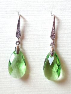 Green Peridot Swarovski Faceted Briolette by CalebsLandJewel, $14.00 Green Pear-shaped Teardrop Earrings For Formal Occasions, Formal Green Teardrop Gemstone Earrings, Green Crystal Earrings For May Birthstone Anniversary, Formal Green Sterling Silver Teardrop Earrings, Formal Green Teardrop Sterling Silver Earrings, Green Sterling Silver Teardrop Earrings For Formal Occasions, Green Briolette Earrings For Anniversary, Green Drop Teardrop Earrings For Formal, Green Teardrop Earrings For Formal Occasions