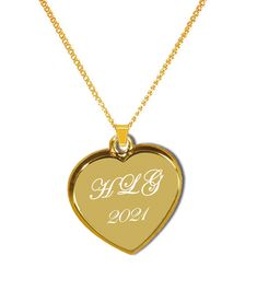 "This personalized gold plated heart pendant necklace can be engraved for that special occasion. Add a personalized meaning by engraving a name, date, or initials. Includes 20 inch chain Dimensions: 0.875\" x 0.875\" Material Gold Plated How To Send Engraving Instructions: When you are ready to order click ADD TO CART. During checkout fill out the ADD A NOTE section with your engraving instructions. You can also send a message prior to purchase to discuss the engraving you would like." Gold Nameplate Heart Necklace For Gift, Personalized Gold Necklaces For Anniversary Gift, Personalized Gold Heart Pendant Name Necklace, Personalized Gold Name Necklace For Valentine's Day, Gold Nameplate Charm Necklace For Valentine's Day, Customizable Gold Heart Necklace, Customizable Gold Heart Necklace For Gift, Gold Heart Nameplate Necklace, Gold Nameplate Heart Necklace