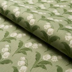 a green and white floral print fabric