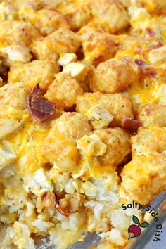 a casserole dish with tater tots and bacon on top is shown