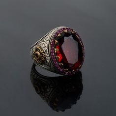 We designed this unique red zircon stone design for you and produced it carefully. This ring will be an unforgettable, stylish and useful gift to your loved ones. We package the ring in a way that is suitable for gifting. -Item Details - Gender : Male / Female - Materials: 925K Sterling Silver - weight: 12-18 gr * Ready to Ship in 1-3 Business Days * The product is sent with a suitable box for gifting. *visit our store for unique unique jewelry and the most advantageous prices Please feel free t Luxury Ruby Rings With Gemstone Accents, Red Garnet Ring For Gift, Luxury Red Jewelry With Gemstone Accents, Fine Jewelry Red Ruby Ring Gift, Luxury Rings With Gemstone Accents For Gift, Luxury Red Ruby Gemstone Ring, Red Ruby Ring Fine Jewelry Gift, Garnet Ruby Ring Gift, Sterling Silver Ruby Ring With Gemstone Accents As Gift