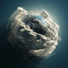 the earth is covered in clouds and sunlight