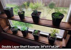 a window sill filled with potted plants in front of a glass door that says double layer shelf example