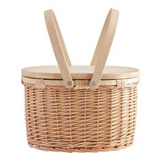 a wicker basket with two wooden handles