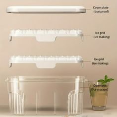 three plastic containers with dividers and lids on top of a counter next to a cup