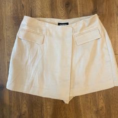 Express Women’s Linen Blend Skirt Size 10 Nwt Tan / Nude Color Looks Like Skirt In Front Shorts Underneath Side Zip Very Short Beige Skort For Spring, Elegant Beige Bottoms With Short Inseam, Beige Fitted Short Skort, Elegant Cotton Mini Bottoms, Fitted Beige Short Skort, Elegant Mini Length Cotton Bottoms, Fitted Beige Mini Skirt, Chic Beige Short Mini Skirt, Trendy Beige Skirt