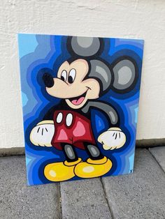 a painting of mickey mouse on a blue background