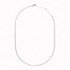 While traditional tennis necklaces are made with diamonds, this silver version is made with cubic zirconia stones that sparkle just as brilliantly as diamonds.


Cubic zirconia stone size: 1.5mm. Classic White Crystal Tennis Necklace, Silver Diamond Chain Necklace With Brilliant Cut, Classic Tennis Necklace In Diamond White Cubic Zirconia, White Gold Tennis Necklace With Diamond Accents And Crystal, Classic Diamond White Tennis Necklace, Dazzling Diamond White Tennis Necklace With Diamond Cut, White Gold Diamond Tennis Necklace With Sparkling Stones, Classic Tennis Necklace With Sparkling Stones, White Gold Tennis Necklace With Diamond Cut Cubic Zirconia