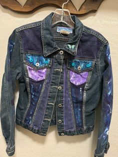 This Womens Jackets & Coats item is sold by Studio16a. Ships from Laveen, AZ. Listed on Jul 20, 2024 Blue Jean Jacket Designs, Blue Recycled Denim Jacket With Patches, Fitted Blue Denim Jacket With Patches, Hand Painted Blue Outerwear For Spring, Fitted Blue Denim Jacket For Festival, Blue Hand Painted Outerwear For Spring, Hand Painted Blue Spring Outerwear, Blue Hand Painted Spring Outerwear, Hand Painted Fitted Cotton Outerwear