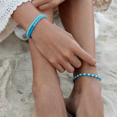 Experience the calm and serene essence of the ocean with our Pura Vida Canal Blues Seascape Stretch Bracelet. Made from high-quality materials, this stretch bracelet offers a comfortable and secure fit. Its vibrant colors and unique design add a touch of beauty to any outfit. Perfect for anyone who loves the ocean and wants to add a pop of color to their style. Vinyl discs are strung on durable stretch elastic cord that adjusts and stretches to any size Silver plated brass logo bead is approximately 3.5mm in diameter Total length of bracelet: 6.5" Because jewelry products are handcrafted by artisans, dimensions may vary from piece to piece Easy On Easy Off- one size fits most Free People Sandals, Nursing Friendly Dress, Pura Vida Bracelets, Wedge Loafers, Maternity Shops, The Calm, Metal Charm, Stretch Bracelet, Girls Accessories