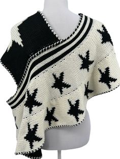 Elan 1 Shoulder Reversible Off White & Black Star Patterned Knit Poncho Shrug Womens One Size. 100% acrylic. Style SWP60 In excellent condition - a few loose threads - please see all photos and description In most cases, the item I am selling is preowned and may or may not have been laundered prior to shipment.  I do my best to describe any flaws or imperfections, so please read all details I provide. If you have a special request such as expedited or combined shipping, please communicate with m Poncho Cloak, Shoulder Off, Poncho Crochet, Cute Star, Knit Poncho, Cute Stars, Crochet Poncho, Knitted Poncho, Star Pattern