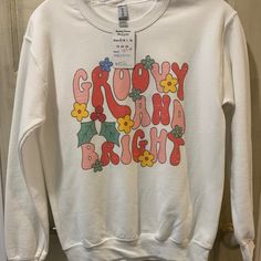 White Groovy And Bright Sweatshirt Available In Sizes Small & Large. Retro White Sweatshirt For Spring, Retro White Winter T-shirt, Groovy Theme, Color White, Womens Tops, Sweatshirts Hoodie, Sweatshirts, Women Shopping, White