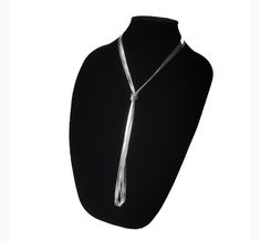 The liquid-like texture of the sterling silver cylinders  strung together by hand gives to this this lovely layering long necklace the flexibility to be worn long, wrapped or doubled up. Stylishly sleek, extra slick and easy to wear, is the versatile multi-way necklace your or her jewelry collection craves! Wear it lasso style or create custom layered looks. Check out pictures for ideas. Our Liquid Silver Necklace with 10 strands is a great gift idea for wives, moms, teachers, sisters or any oth Silver Lariat Chain Necklace For Layering, Elegant Long Drop Silver Chain Necklace, Formal Silver Lariat Long Necklace, Silver Long Drop Lariat Necklace For Formal Occasions, Adjustable Silver Long Necklace For Formal Occasions, Silver Lariat Necklace For Party, Silver Multi-strand Lariat Necklace Gift, Silver Lariat Long Necklace As Gift, Silver Lariat Long Necklace For Gift