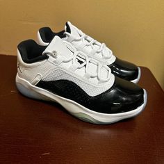 Jordan Boys White Black Air Jordan 11 Comfort Low Dv2208-100 Sneakers Size Us 7 Brand: Jordan Department: Boys Size: 7 Color: White Black Type: Athletic Style: Sneaker Style Code: Dv2208-100 Pattern: Solid Theme: Sports Shoe Shaft Style: Low Top Closure: Lace Up Features: Comfort, Adjustable Occasion: Activewear Seasons: All Season Condition: New Without Box I Offer Discounts For All Return Customers. - Jvs White Sole Low-top Jordan Shoes With Laces, Low-top Jordan Shoes With Branded Insole And White Sole, Jordan Shoes With Air Cushioning For Light Sports, Jordan Low-top Running Shoes, Low-top Jordan Shoes With Boost Midsole For Light Sports, Low-top Jordan Running Shoes With Laces, Low-top Jordan Running Shoes, Sporty Jordan Shoes With Air Cushioning And White Sole, Low-top Jordan Shoes For Light Sports With White Sole