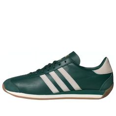 adidas Country OG 'Collegiate Green' IH7514 Green Leather Sneakers With Three Stripes Branding, Green Sports Sneakers With Three Stripes Branding, Green Adidas Sneakers For Sports, Green Sneakers With Three Stripes Branding For Sports, Green Sporty Sneakers With Three Stripes, Green Sneakers With Three Stripes Branding, Adidas Logo Sporty Sneakers For Sports Events, Sporty Adidas Logo Sneakers For Sports Events, Sporty Adidas Sneakers For Sports Events