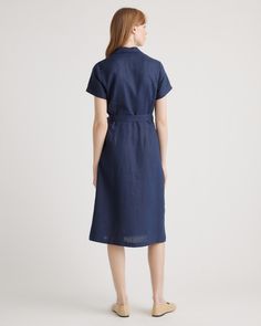 This midi linen dress should be in every wardrobe. Made from 100% organic linen and designed to be versatile, with elegant buttons down the front, and two pockets at the waist, and adjustable removable belt for the perfect fit.  | Quince | Women's Short Sleeve Dress in Deep Navy, Size Medium, Linen Collared Linen Dress With Buttons For Work, Short Sleeve Linen Dress For Work With Button Closure, Short Sleeve Linen Dress With Pockets For Work, Relaxed Fit Linen Dress With Button Closure For Work, Collared Linen Midi Dress For Work, Linen Dress With Pockets For Workwear, Collared Linen Dress With Pockets For Daywear, Fitted Linen Shirt Dress With Pockets, Casual Linen Dress With Button Closure And Relaxed Fit