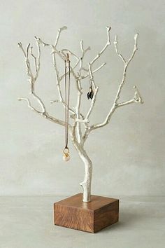 an image of a white tree with beads on it's branches and the words best 20 diy jewelry holder ideas on pinterest