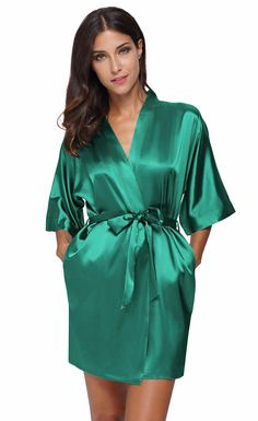 PRICES MAY VARY. Material: Made of good silk-imitation fiber , the fabric is super soft, lightweight,breathable and smooth silky like,not see-throught, a luxurious beautiful satin robes for every ladies Occasions: This short satin robes perfect for every day wearing. Best choice for getting ready robe for Wedding party, Bridal Party, Birthday Party, Lingerie Party, Pajamas Party ,Spa,Ball, Bachelorette Party,Halloween Party etc. A lightweight kimono cover ups for beach,gym,pool,boxer robe etc Features: Available in multi-colors.One with lace or floral trim around sleeves and hem, and plain robe for selecting. This short kimono robe featuring in elegant oblique v-neck design, with 2 side pockets, short sleeves, outside waist and inner ties to keep closure Best gifts:Great gifts for bride,br Silk Robe Short, Bride Robe Getting Ready, Bachelorette Party Halloween, Cover Ups For Beach, Robes For Bride, Satin Bathrobe, Women Silk Robe, Party Pajamas, Pajamas Party