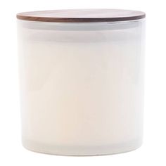 a white candle with a wooden lid on a white background