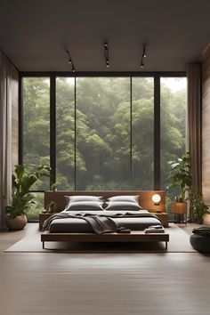 a large bed sitting next to a window in a room with wooden walls and flooring