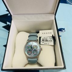 Women’s Swiss G Timeless Pastel Sky Blue Leather Strap Watch 38mm Luxury Gucci Watch Accessories With Diamond Hour Markers, Designer Blue Watch As Gift, Designer Blue Watches As Gift, Designer Blue Watch For Gift, Designer Blue Watches Gift, Designer Blue Watch, Gucci Designer Watch Accessories With Subdials, Designer Gucci Watches With Subdials, Designer Gucci Chronograph Watch