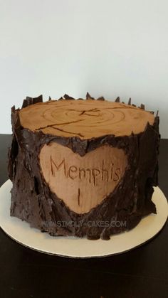 a cake that has been decorated with wood slices and the words memphis on it