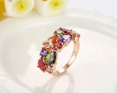 Anneaux de zircon colorés exquis


 Élevez votre style avec notre collection de bagues en zircon coloré. Ces pièces captivantes présentent une superbe gamme de pierres précieuses en zircon dans un spectre de teintes vibrantes, conçues de manière experte pour créer une symphonie de couleurs sur vos doigts. Chaque bague est une œuvre d'art, méticuleusement conçue et sertie de métaux de haute qualité pour garantir une beauté et une durabilité durables. Que vous recherchiez une déclaration audacieuse ou un accent subtil, nos bagues en zircon coloré offrent une façon unique et éblouissante d'exprimer votre individualité. Explorez la fusion du design contemporain et de l'élégance intemporelle avec ces bagues exquises qui passent sans effort des occasions décontractées aux occasions formelles. Multi-stone Cubic Zirconia Party Rings, Party Rings With Multi-stone Cubic Zirconia, Multicolor Gemstone Crystal Ring For Party, Multicolor Cubic Zirconia Party Rings, Multicolor Cubic Zirconia Wedding Rings, Formal Multicolor Rings With Prong Setting, Multicolor Gemstone Ring For Party, Multicolor Cubic Zirconia Crystal Ring For Weddings, Multicolor Gemstone Party Rings