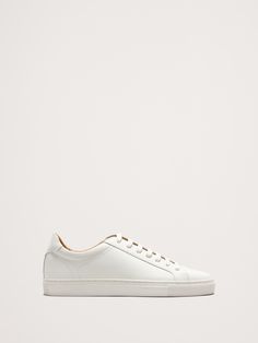 We can't get enough of these sneakers (and neither can you).  There's lots to love: leather uppers, sleek design, and lightweight OrthoLite® performance insoles—which wick away moisture for comfort.  Leather uppers.  Rubber soles.  B width. Minimalist Silhouette, Wicks, Sneakers White, Leather Sneakers, Sleek Design, Banana Republic, Leather Upper, Personal Style, Sleek