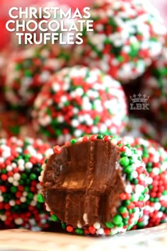 chocolate covered cookies with sprinkles and candy on the top are ready to be eaten