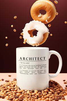 a donut is falling into a coffee mug with the word architet above it