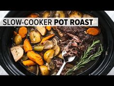 slow cooker pot roast with carrots, potatoes and meat in the crockpot