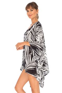 Having a stylish beach cover up is a must! The beautifully printed tunic beach coverup creates a vibrant look. Easy to pull on and easy to pack. Making clothes for the traveling woman. Boho design Lightweight beach dress Semi-Sheer Hand wash in cold water, hang to dry Beachy Tropical Print Cover-up For Beach, Flowy Cover-up For Resort Season Vacation, Beach Party Tropical Print Cover-up, Oversized Beachy Cover-up For Vacation, Summer Floral Print Beach Cover-up, Tropical Long Sleeve Cover-up For Beach Season, Summer Beachwear Tunic For Beach Cover-up, Flowy Floral Print Cover-up For Vacation, Long Sleeve Printed Beach Dress Cover-up