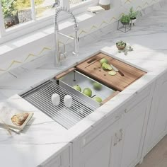 a kitchen sink that has apples in it