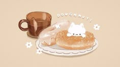 two donuts on a plate next to a coffee cup and saucer with doughnuts