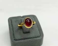 Natural Ruby Ring * Dainty Cabachon Ring * Genuine Ruby & 14K Solid Gold * Best Gift for her * Handmade Ring ◎ Details ◎ ○ Gemstone Details .Natural RUBY (Glass Filled) Oval Cut 10x8 mm approx. 4.46 ct ○ Gold Details 14K Solid Gold Width of Band : 3.00 mm Weight of Ring : approx 4.60 gr Made to Order HANDMADE ITEM ○ Upgrade to Solid 18K Gold, please click the link below: https://www.etsy.com/listing/962826004 For more CABACHON BEZEL rings : http://etsy.me/37fvI60 All of our jewelleries are d 14k Gold Oval Cabochon Birthstone Ring, 14k Gold Oval Cabochon Birthstone Ring For Gift, Cabochon Ruby Ring Fine Jewelry Gift, Cabochon Ruby Ring As Gift Fine Jewelry, Gold Cabochon Birthstone Ring Gift, Yellow Gold Cabochon Birthstone Ring Gift, 14k Gold Cabochon Birthstone Ring Gift, Yellow Gold Birthstone Ring With Cabochon For Gift, Fine Jewelry Ruby Cabochon Ring Gift