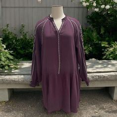 Easel Los Angeles Purple Embroidered Peasant Dress Boho Chic Tunic Festival

Brand: Easel Los Angeles
Size: Small
Material: Lightweight fabric
Features: Crinkle-texture fabric, white embroidered details, ruffle hem, long sleeves with tie cuffs, relaxed peasant fit
Occasion: Casual outings, weekend wear, music festivals, or bohemian-inspired events

Keywords: Easel Los Angeles, Purple Peasant Dress, Boho Embroidered Dress, Ruffle Hem Tunic, Long Sleeve Dress, Festival Outfit, Relaxed Fit, Casual Chic, Lightweight Fabric, Bohemian Style, Crinkle Dress, White Embroidery, Tie Sleeve Dress, Feminine Tunic, Layered Look

Occasion and Style Notes: Perfect for boho-inspired looks or casual outings. Pair with ankle boots and a wide-brim hat for a trendy festival-ready style. Also versatile as a tun Dress Festival Outfit, Boho Embroidered Dress, Crinkle Dress, Dress Boho Chic, Tie Sleeve Dress, Embroidered Dress Boho, Dress Feminine, Boho Chic Dress, Texture Fabric