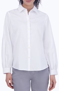 Gathers at the cuffs create light volume in the sleeves of this cotton-blend sateen button-up that's a versatile addition to your workplace wardrobe. 26" length (size Small) Front button closure Point collar Long sleeves with adjustable button cuffs 55% cotton, 45% polyester Hand wash, tumble dry Imported Classic Relaxed Fit Blouse With Cuffed Sleeves, Spring Dress Shirt With Button Cuffs For Work, Classic Blouse With Relaxed Fit And Cuffed Sleeves, Dress Shirt With Button Cuffs For Workwear In Spring, Classic Poplin Tops With Button Cuffs, Classic Poplin Blouse For Daywear, Classic Formal Poplin Blouse, Covered Button Dress Shirt For Work, Workwear Dress Shirt With Covered Buttons