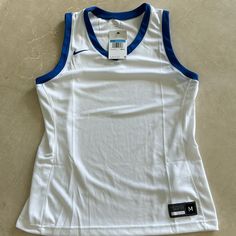 New Women's Nike Basketball White Blue Sleeveless Jersey. M. $55 Nike Casual Sleeveless Vest, Casual Nike Sleeveless Vest, Sleeveless Cotton Nike Top, Nike Sleeveless Summer Tops, Nike Sleeveless Tops For Summer, Nike Blue Sleeveless Tank Top, Nike Retro, Nike Pro Combat, Running Tanks