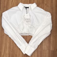 Zara Crop White Shirt Color: White Size: Large Condition: Brand New White Cropped Shirt For Fall, Elegant White Cropped Shirt For Spring, Chic White Cropped Shirt For Summer, Chic White Cropped Shirt For Fall, Chic White Long Sleeve Cropped Shirt, White Cropped Collared Shirt For Spring, White Cropped Shirt With Collar For Spring, White Long Sleeve Cropped Shirt For Day Out, Chic White Collared Cropped Shirt