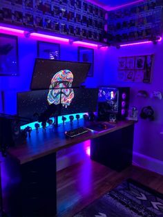 a computer desk topped with two monitors and a keyboard