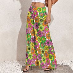 Wide Leg Pants, Retro Pants, Wide Leg Pants Women, 70s Style Pants, 70s Inspired pants, Neon Pants, Floral Pants, Hippie Pants, Boho Pants Designed in California, Handmade to order from overseas I designed this for those who loves the 70s boho hippie style. Super cute neon floral print. I am designing a matching top as well. Great for every day wear or at the beach or any fun parties. Pair it with platform chunky heels, for a super funky style. Hope you enjoy my designs.  Material: Made of 100% Spring Wide Leg Bottoms With Retro Print, Wide Leg Bottoms With Retro Print For Spring, Wide-leg Bottoms With Retro Print For Spring, Casual Wide Leg Pants With Retro Print, Wide Leg Bottoms With Retro Print For Summer, Retro Wide Leg Bottoms For Spring, Retro Bottoms For Beach In Spring, Retro Beach Bottoms For Spring, Multicolor Bottoms With Retro Print For Spring